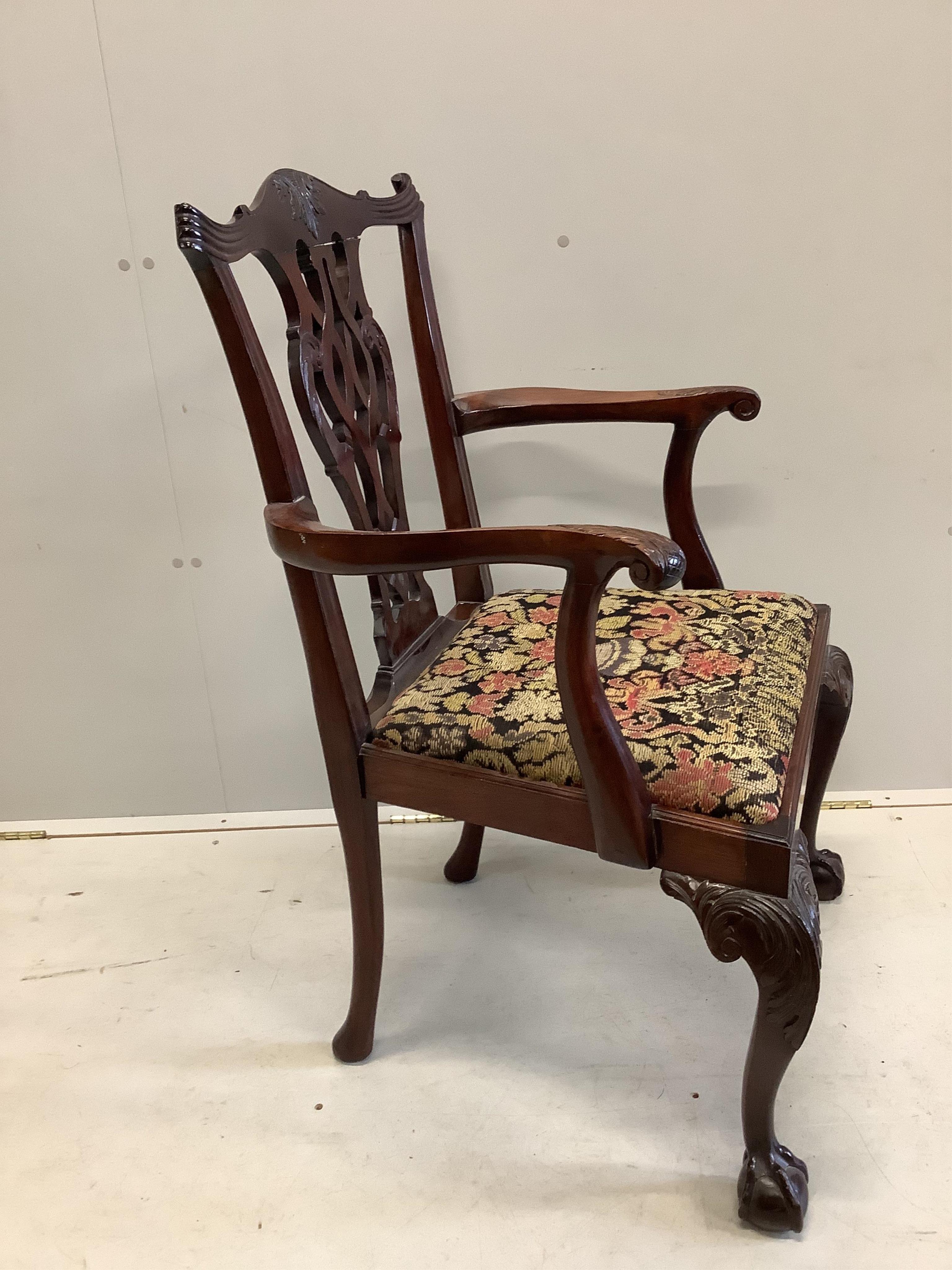 A pair of George III Sheraton style mahogany dining chairs and a pair of George III style mahogany elbow chairs. Condition - good